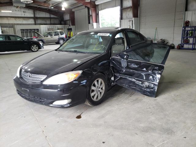 Photo 2 from auction – 2003 TOYOTA CAMRY LE with VIN 4T1BF30K03U051713
