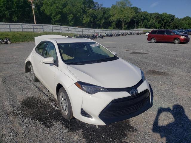 TOYOTA COROLLA L 2018 with VIN 5YFBURHE7JP777834 - Photo from auction