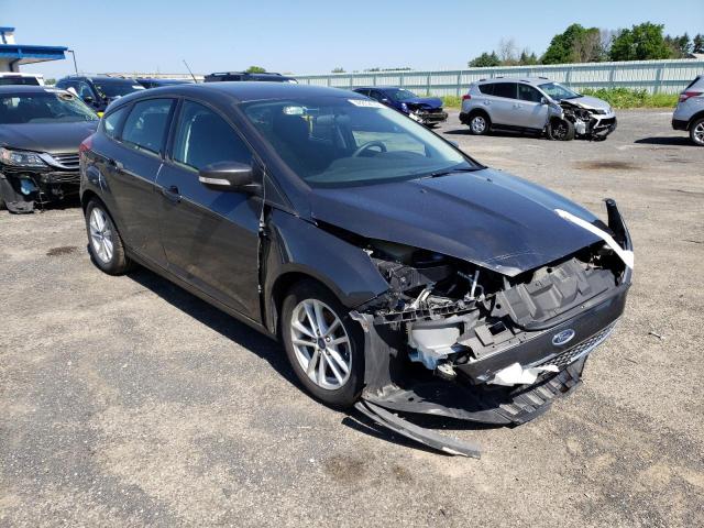 FORD FOCUS SE 2017 with VIN 1FADP3K29HL262757 - Photo from auction