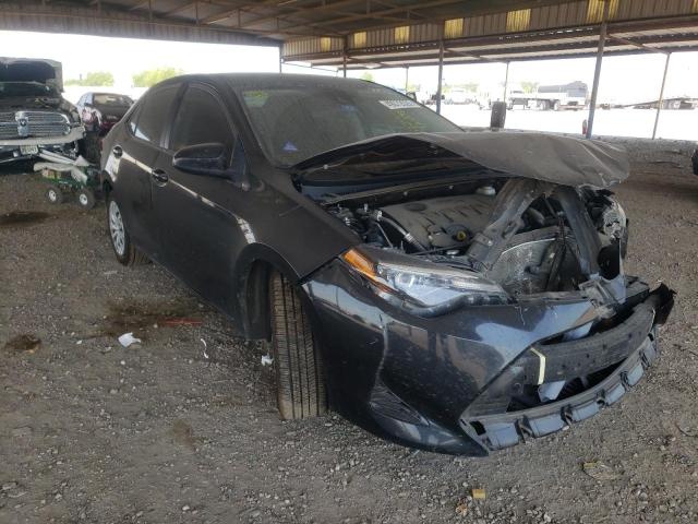 TOYOTA COROLLA L 2019 with VIN 5YFBURHE7KP870595 - Photo from auction