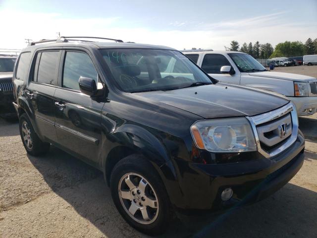 HONDA PILOT TOUR 2011 with VIN 5FNYF4H91BB022122 - Photo from auction