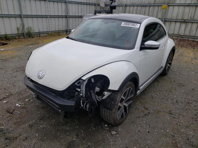 Photo 2 from auction – 2018 VOLKSWAGEN BEETLE DUN with VIN 3VWSD7AT3JM714411
