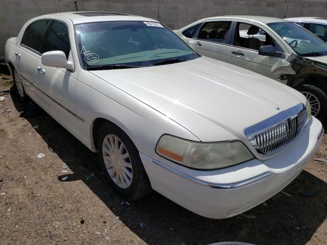 LINCOLN TOWN CAR U 2004 with VIN 1LNHM83W24Y619983 - Photo from auction