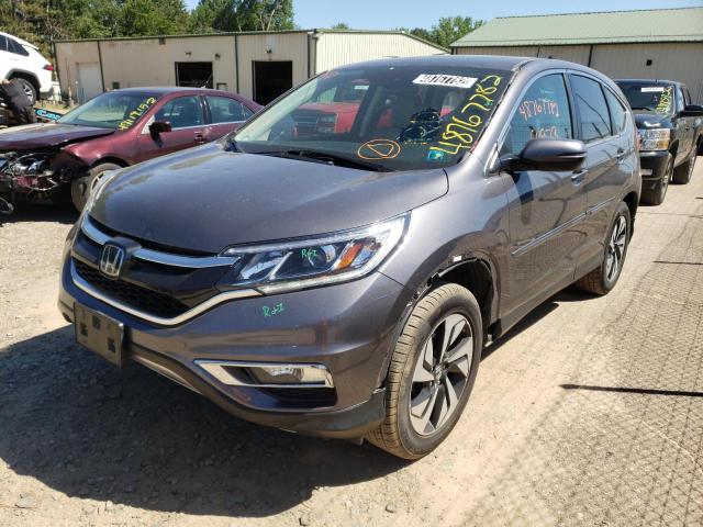 Photo 2 from auction – 2015 HONDA CR-V TOURI with VIN 5J6RM4H91FL099077
