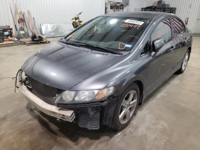 Photo 2 from auction – 2011 HONDA CIVIC LX-S with VIN 19XFA1F66BE037444