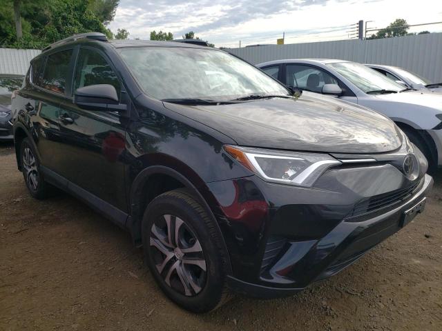 TOYOTA RAV4 LE 2018 with VIN 2T3BFREV8JW736388 - Photo from auction