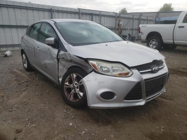 FORD FOCUS SE 2014 with VIN 1FADP3K21EL158338 - Photo from auction
