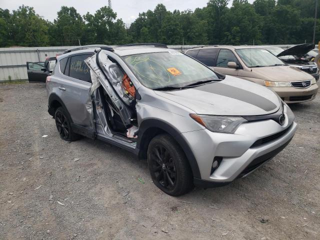 TOYOTA RAV4 2018 with VIN 2T3RFREV3JW715477 - Photo from auction