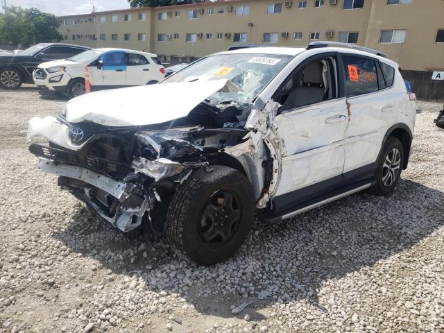 Photo 2 from auction – 2018 TOYOTA RAV4 LE with VIN JTMBFREV2JJ220011