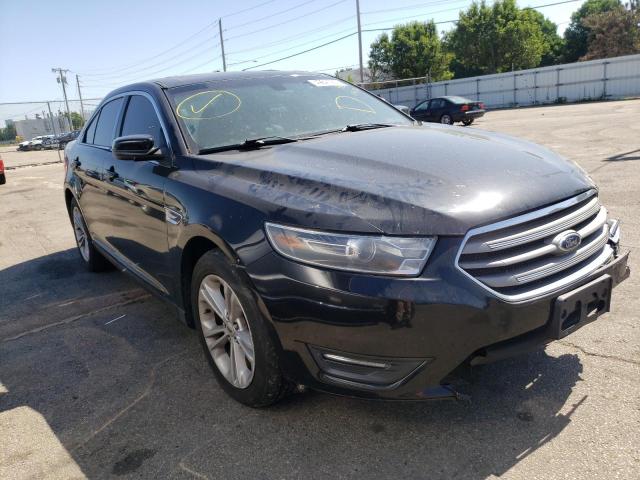 FORD TAURUS SEL 2014 with VIN 1FAHP2E87EG184544 - Photo from auction