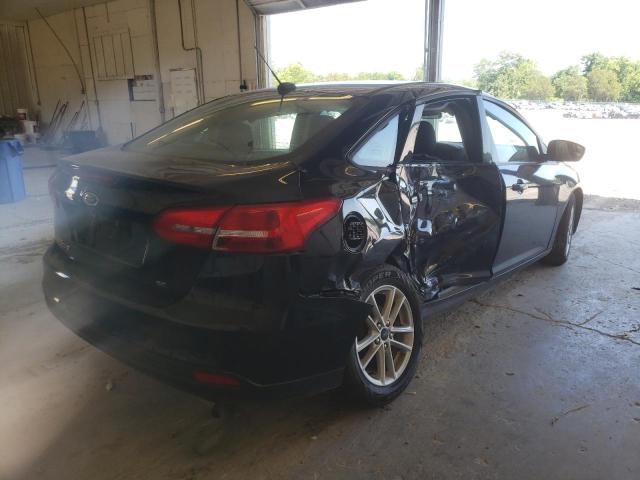 Photo 4 from auction – 2018 FORD FOCUS SE with VIN 1FADP3F21JL226710