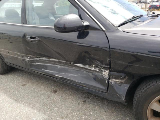 Photo 9 from auction – 2004 KIA OPTIMA LX with VIN KNAGD128645327066