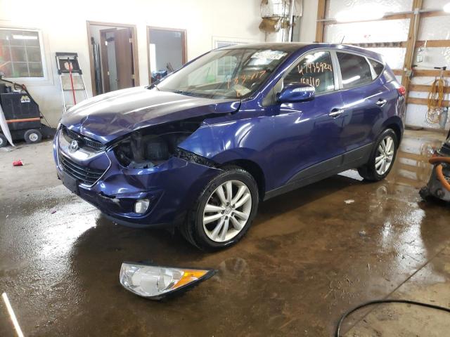 Photo 2 from auction – 2011 HYUNDAI TUCSON GLS with VIN KM8JU3AC2BU133417