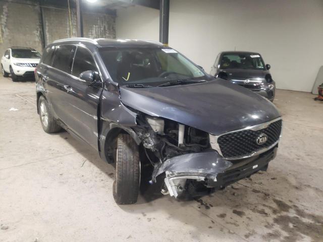 KIA SORENTO LX 2018 with VIN 5XYPGDA38JG374152 - Photo from auction