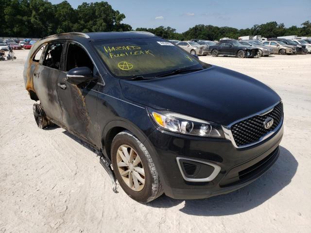 KIA SORENTO LX 2018 with VIN 5XYPG4A31JG397708 - Photo from auction