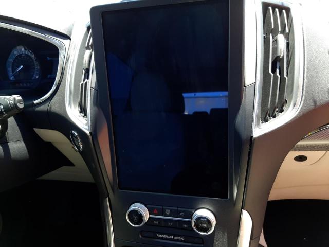 Photo 9 from auction – 2021 FORD EDGE TITAN with VIN 2FMPK4K95MBA57015