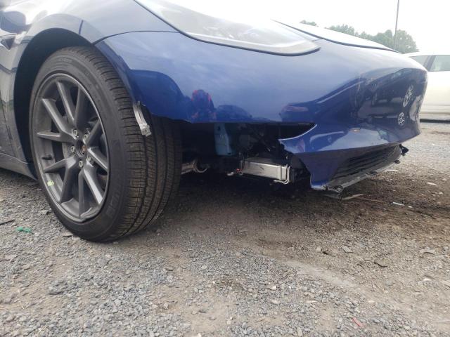 Photo 9 from auction – 2022 TESLA MODEL 3 with VIN 5YJ3E1EB3NF163717