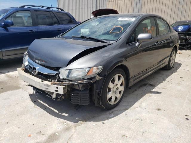 Photo 2 from auction – 2011 HONDA CIVIC LX with VIN 19XFA1F52BE033205