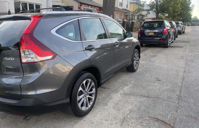 Photo 4 from auction – 2014 HONDA CRV with VIN 2HKRM4H37EH617598