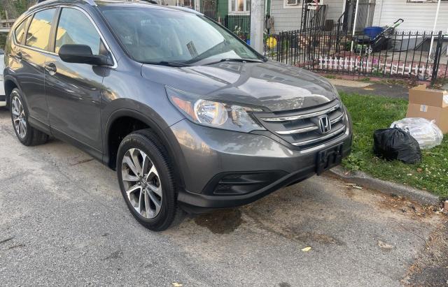 HONDA CRV 2014 with VIN 2HKRM4H37EH617598 - Photo from auction