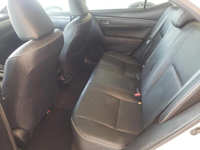 Photo 6 from auction – 2014 TOYOTA COROLLA EC with VIN 5YFBPRHE9EP070277