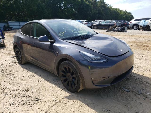 TESLA MODEL Y 2021 with VIN 5YJYGDEE4MF115296 - Photo from auction