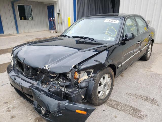 Photo 2 from auction – 2004 KIA OPTIMA with VIN KNAGD126045351393