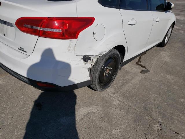 Photo 9 from auction – 2015 FORD FOCUS SE with VIN 1FADP3F29FL254973