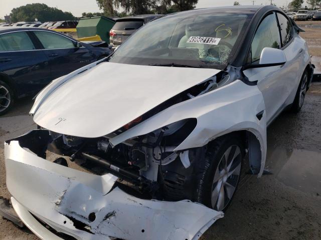 Photo 2 from auction – 2021 TESLA MODEL Y with VIN 5YJYGDED9MF163240