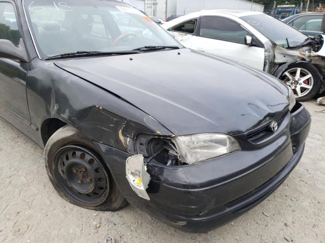 Photo 9 from auction – 1999 TOYOTA COROLLA VE with VIN 2T1BR12E4XC228029