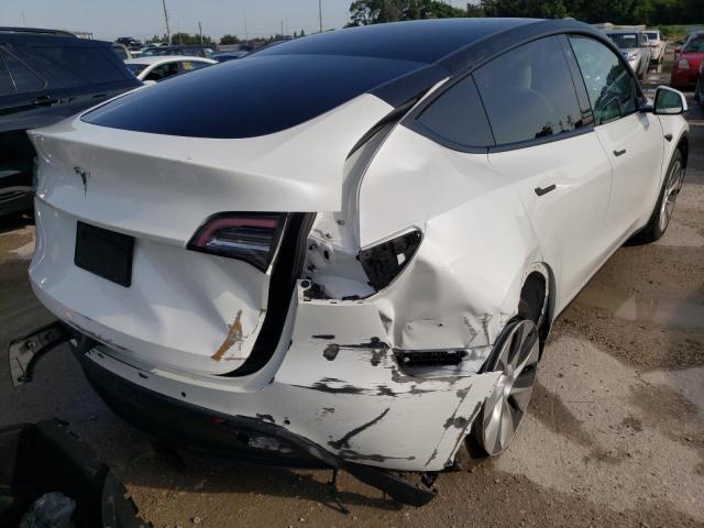 Photo 4 from auction – 2021 TESLA MODEL Y with VIN 5YJYGDED9MF163240