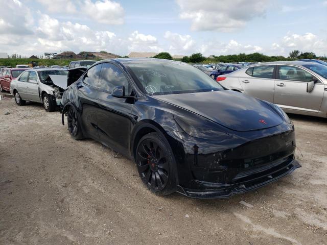 TESLA MODEL Y 2020 with VIN 5YJYGDEF1LF028091 - Photo from auction