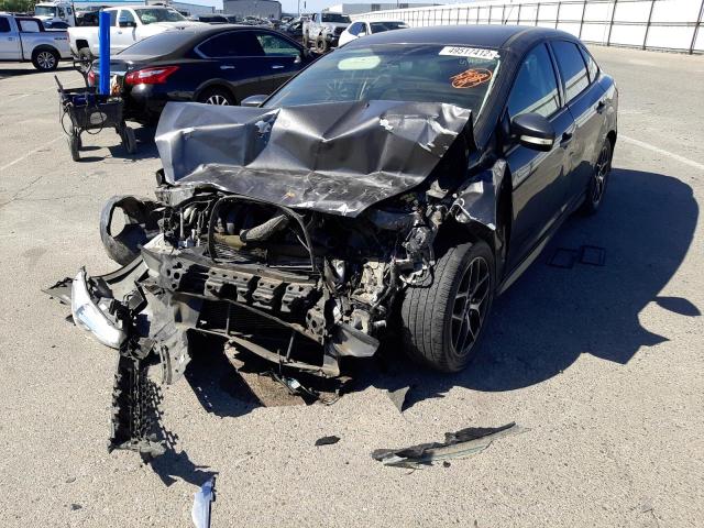Photo 2 from auction – 2015 FORD FOCUS SE with VIN 1FADP3F27FL232633