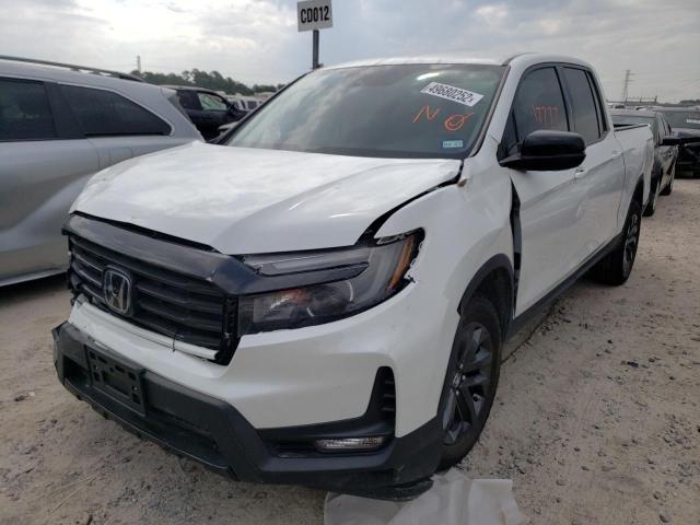 Photo 2 from auction – 2021 HONDA RIDGELINE with VIN 5FPYK3F18MB010191