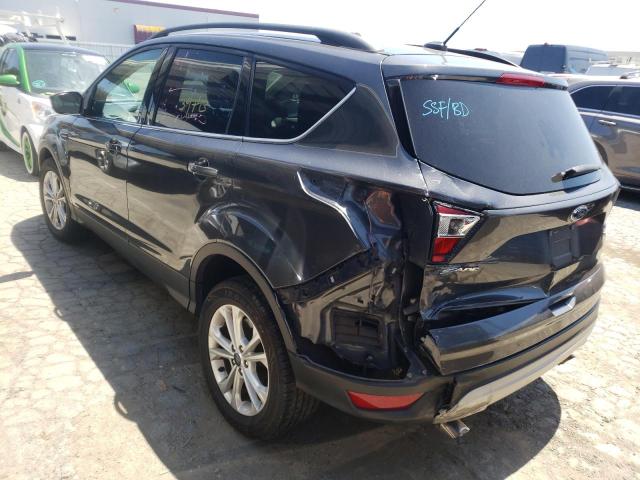 Photo 3 from auction – 2018 FORD ESCAPE SE with VIN 1FMCU0GD1JUD08052