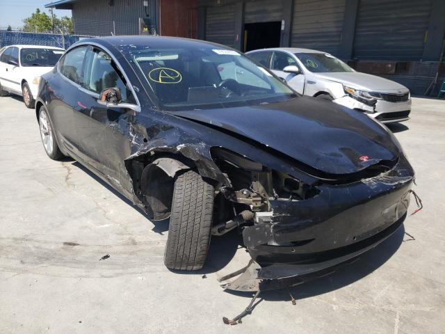 TESLA MODEL 3 2018 with VIN 5YJ3E1EA8JF015029 - Photo from auction