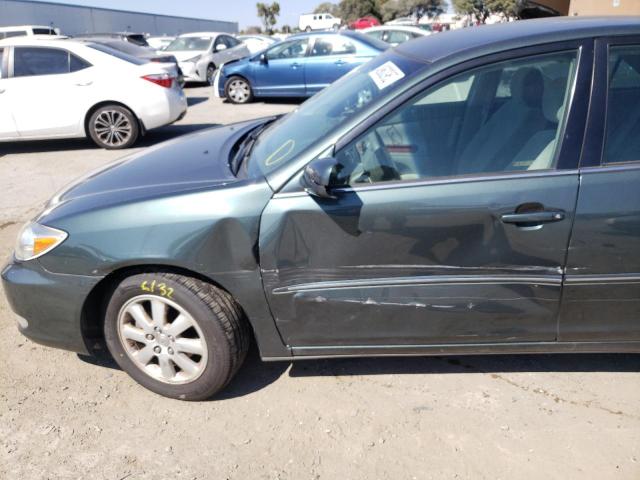 Photo 9 from auction – 2004 TOYOTA CAMRY LE with VIN 4T1BE30K84U288759