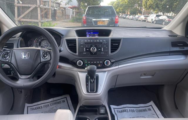 Photo 9 from auction – 2014 HONDA CRV with VIN 2HKRM4H37EH617598