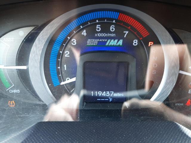 Photo 8 from auction – 2010 HONDA INSIGHT EX with VIN JHMZE2H77AS034138