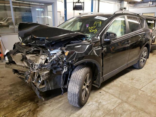 Photo 2 from auction – 2017 TOYOTA RAV4 XLE with VIN 2T3RFREVXHW684383