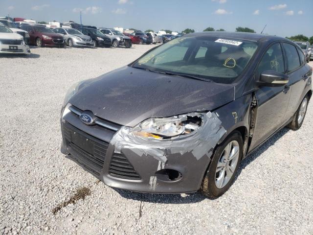 Photo 9 from auction – 2013 FORD FOCUS SE with VIN 1FADP3K29DL115915