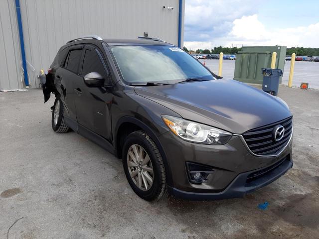 MAZDA CX-5 TOURI 2016 with VIN JM3KE2CY8G0704410 - Photo from auction