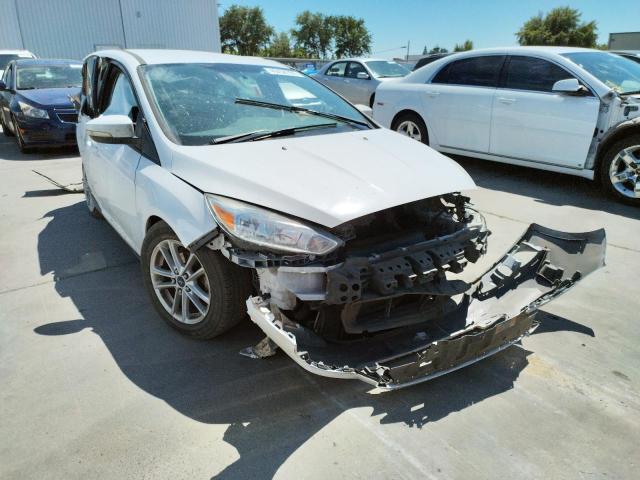 FORD FOCUS SE 2015 with VIN 1FADP3F27FL335325 - Photo from auction