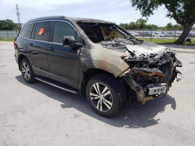 HONDA PILOT EXLN 2017 with VIN 5FNYF5H79HB003573 - Photo from auction