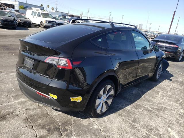 Photo 4 from auction – 2022 TESLA MODEL Y with VIN 7SAYGAEE0NF312906