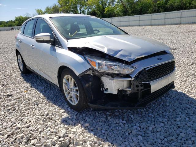 FORD FOCUS SE 2017 with VIN 1FADP3K2XHL339572 - Photo from auction