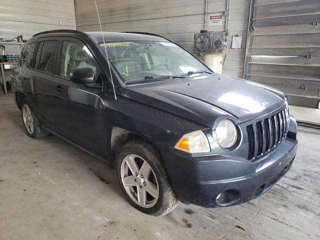 JEEP COMPASS 2007 with VIN 1J8FF47WX7D143866 - Photo from auction