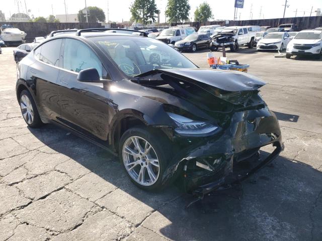 TESLA MODEL Y 2022 with VIN 7SAYGAEE0NF312906 - Photo from auction
