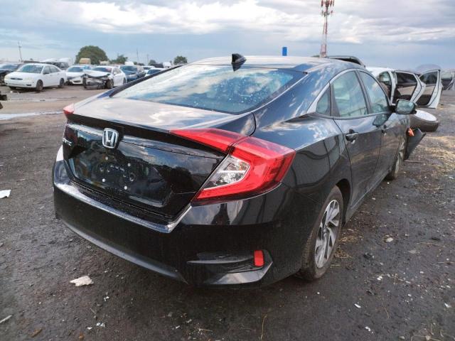 Photo 4 from auction – 2018 HONDA CIVIC EX with VIN 19XFC2F78JE204751