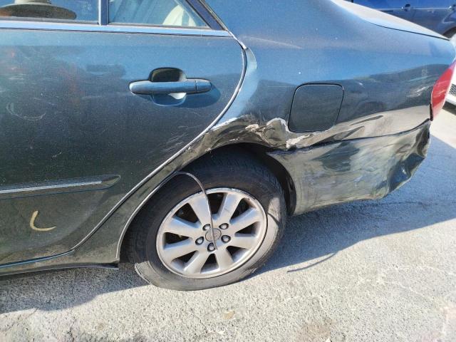 Photo 9 from auction – 2002 TOYOTA CAMRY LE with VIN JTDBF30K020010959